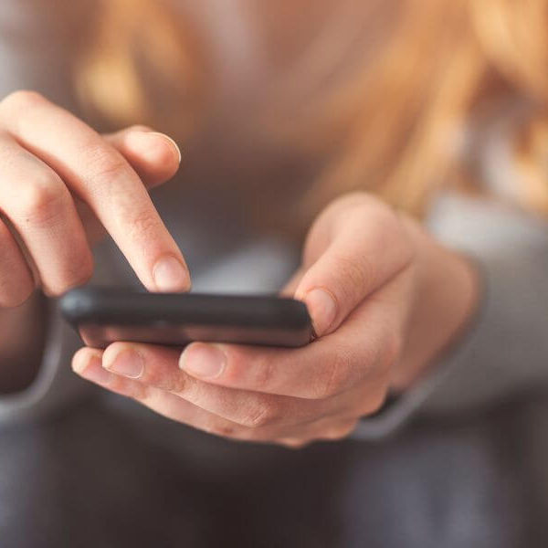 Female scrolling on the phone