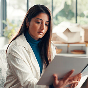 Tenant reading her tennancy aggreement